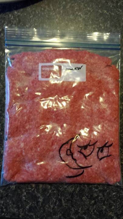 Seems like the logical next step when you have a sharpie and a bag of raw meat.