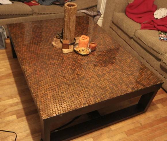I covered my coffee table with 4500 pennies. It took about 25 hours, $75 worth of super glue, and two coats of epoxy, but I think it turned out alright.