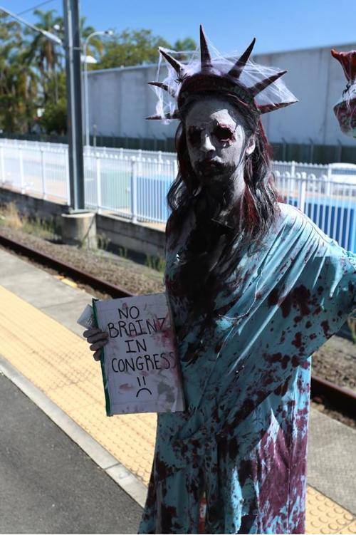 I attend the Brisbane, Aus zombie walk every year. My 2013 costume was inspired by recent events in the US