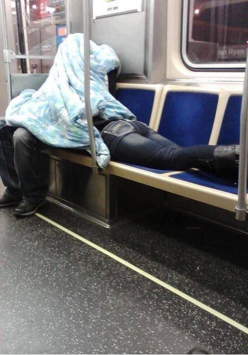 Maybe he is reading her a scary story.