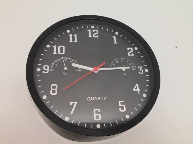 My new purchased clock from the dollar store... it will never be 9:15 :(