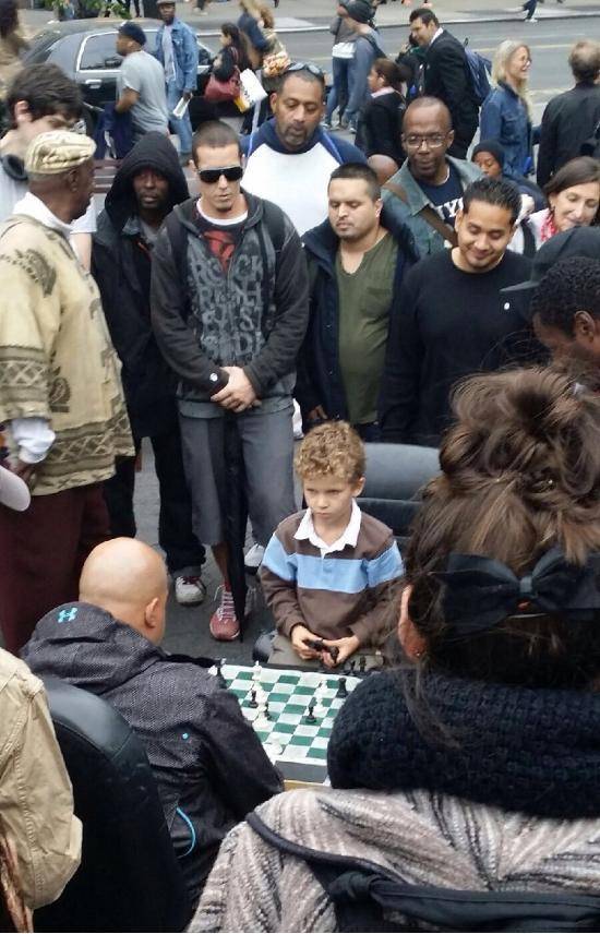 A crowd gathering in Union Square caught my attention. The kid won.