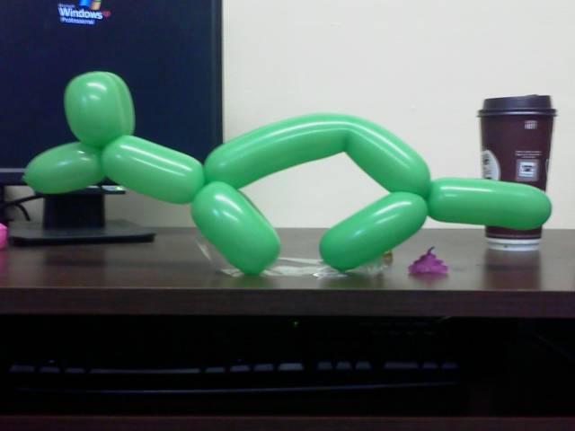 A co-worker told me my animal balloons were sh*tty. So I did this to her desk...