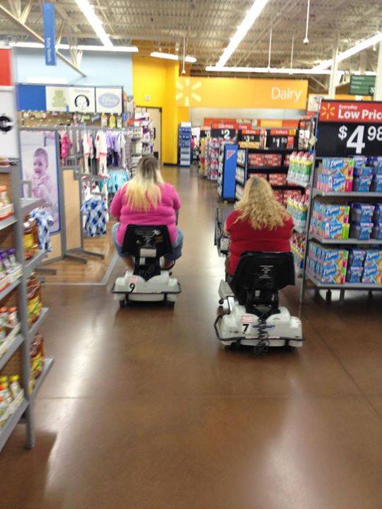 It looks like number 9 is taking a slight lead over number 7 as they approach the dairy section!