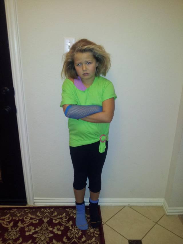 80’s day at school. My daughter hates her hair and thinks she looks stupid. She didn't believe me when I said I looked like that every day.