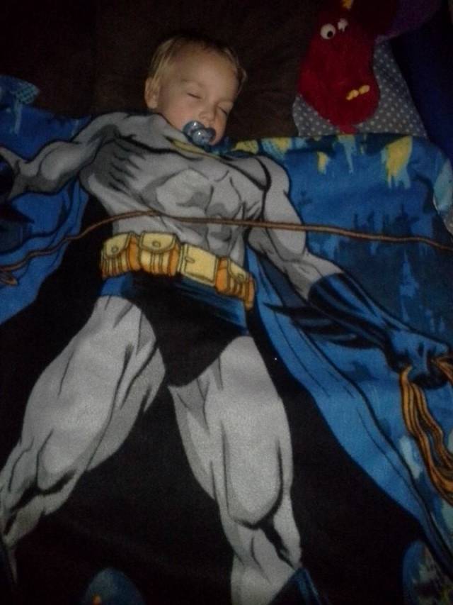 I put my son's Batman blanket on top of him...