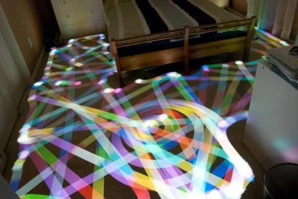 Long exposure of a Roomba outfitted with LEDs