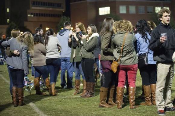 Behold, a wild pack of white girls. Note the brown boots.