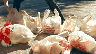 How Real Men Carry Groceries.