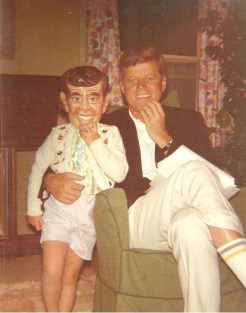 JFK with daughter Caroline wearing a mask of JFK.