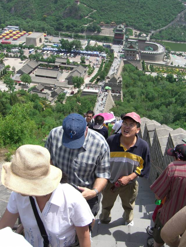 I met the same guy while taking a picture of the Great Wall in 2006.