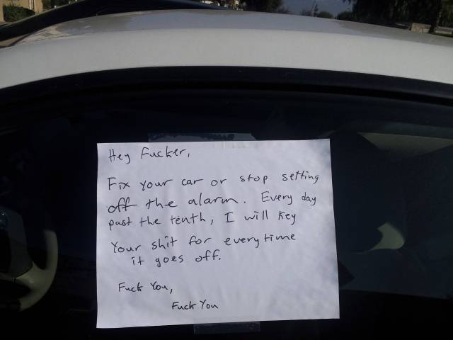 I was throwing out the trash this morning when I saw this on someone's car