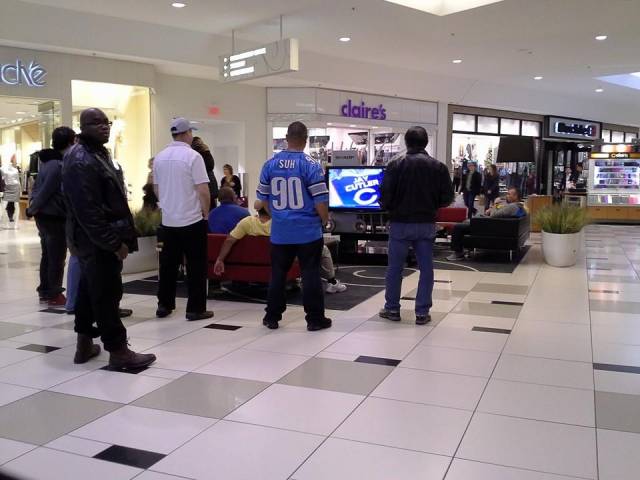 When men are forced to go to the mall on Football Sunday...