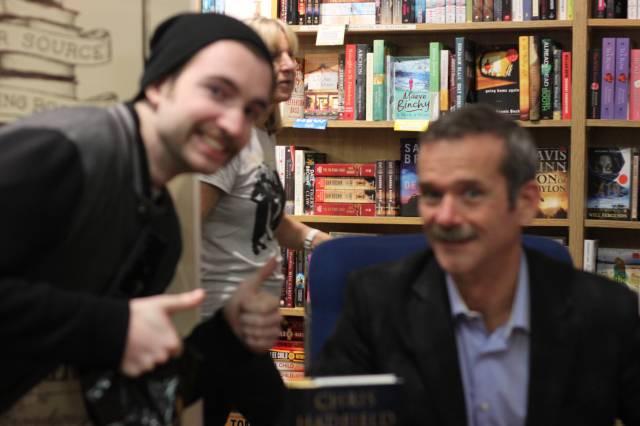 Met Chris Hadfield. Handed DSLR to girlfriend so she could take a picture of us. GOOD JOB HUN.