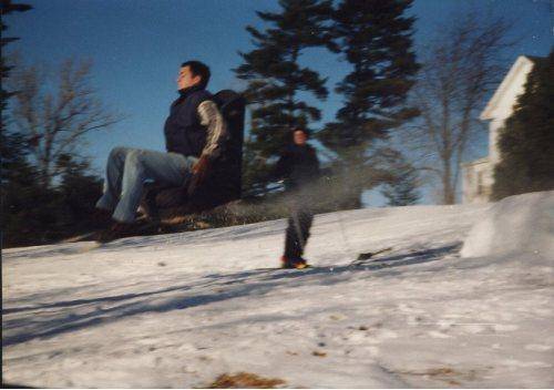 skiing with a seat