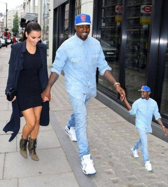Kanye taking a stroll with his favorite person. And Kim.