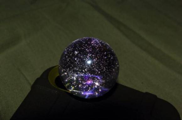 So I had a marble and my phones flashlight, I think I created a mini universe?