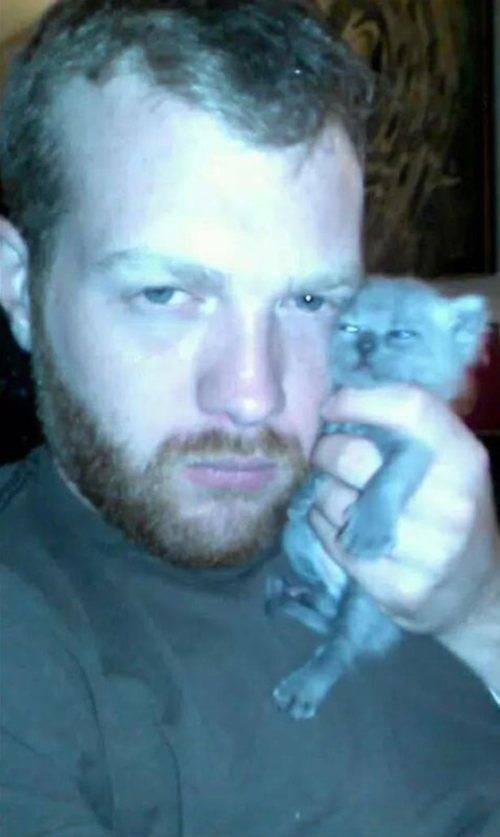 Suspicious cat is suspicious.