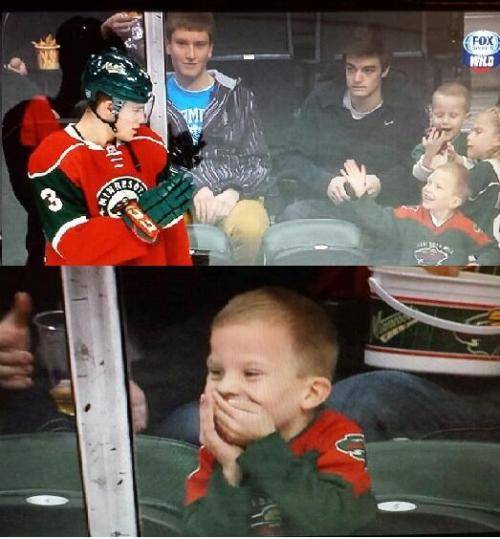 Hockey player waves at young fan – Makes his day.