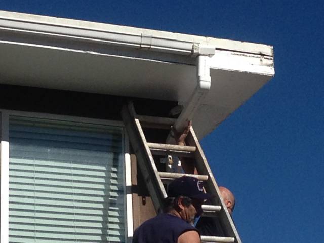 My uncles made a mistake installing a new rain gutter...