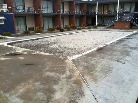 The motel advertised that they had a pool. They did NOT mention that it was filled with gravel