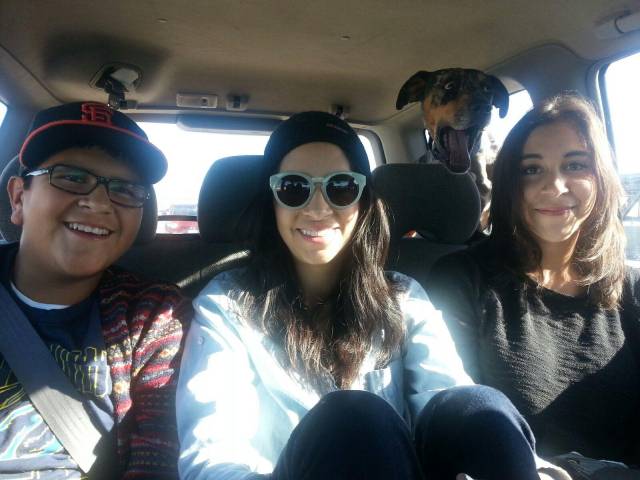 Trying to take a picture of my siblings.