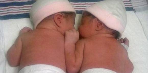 One twin born in 2013, the other in 2014