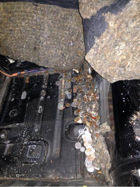 While ripping the carpet out of our Miata we found 18 years of lost change.
