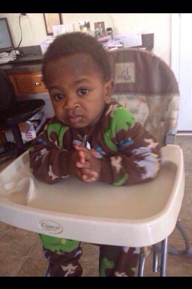 This might be the oldest looking baby I've ever seen.