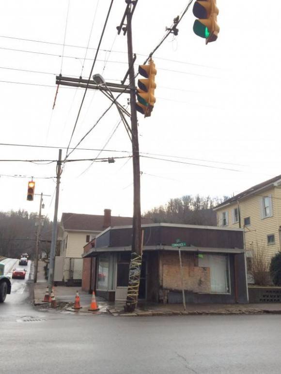 Here is how you fix a telephone pole in West Virgina. Duct tape a 2×4 to it.