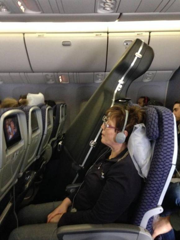 So the guy in the row next to me purchased a seat (Milan to NYC) for his Cello. While boarding, different flight attendants would walk past and tell him he couldn't have it there and he kept producing a ticket for the seat.