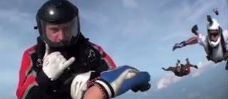 Helmet cam from unconscious skydiver being rescued mid-air