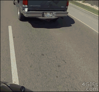 Innocent driver mugged by passing motorcyclist