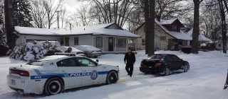 Subaru WRX pulls out cop car stuck in snow