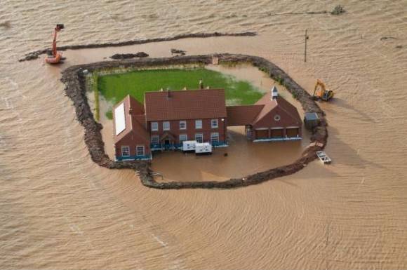 One man in England trying to save his house from the floods