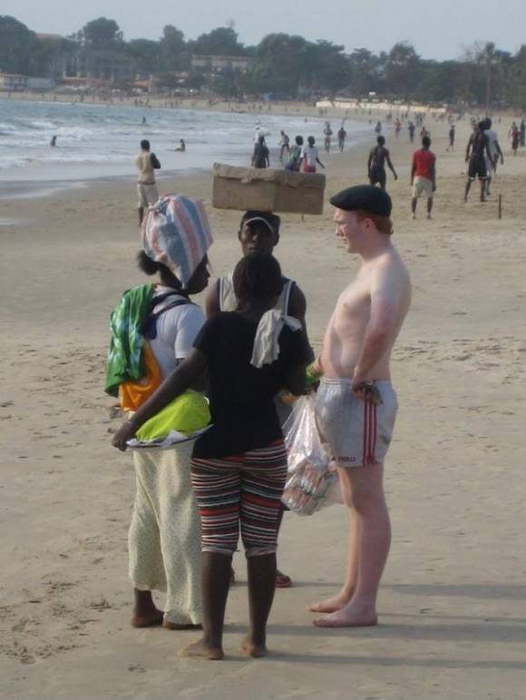 My Irish friend talking to some of the locals in Sierra Leone, Africa.