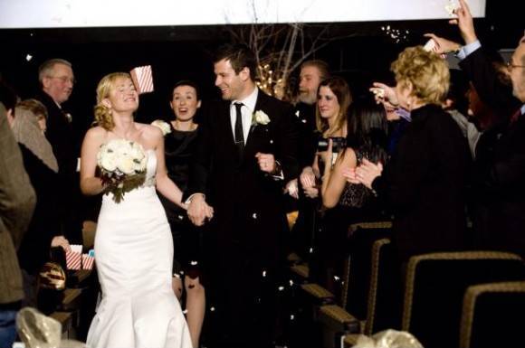 Got married in a movie theatre. Gave guests popcorn to throw instead of rice. Knowing my friends, I should have expected this...