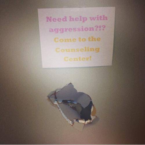 I work at a university counseling center, someone punched a hole in the hallway next to our office. I took the opportunity to make a sign!