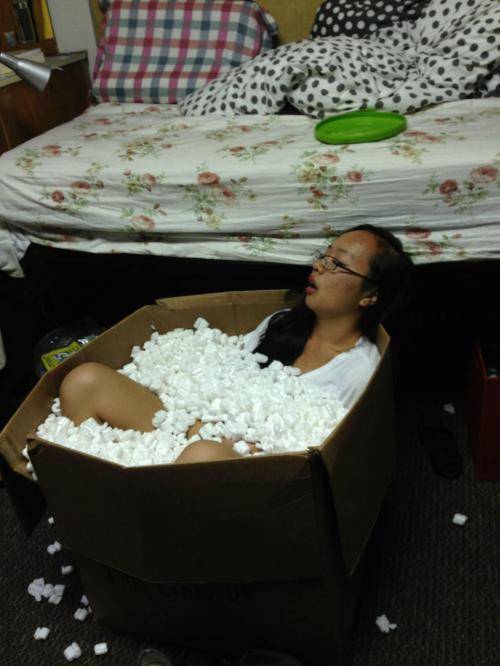 I wake up at 2am to find my roommate passed out in a box of packing peanuts.