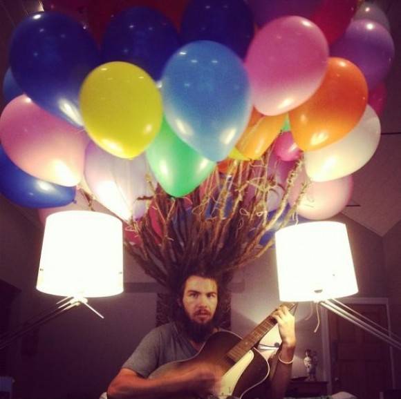 My friend attached balloons to his dreads and then cut them off yesterday