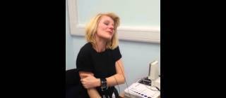 A 40 year old woman, born deaf, hears for the first time.