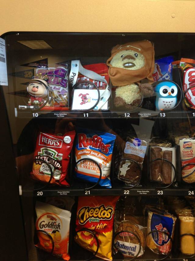 My coworker's idea of April Fools; putting my desk flair in the vending machine