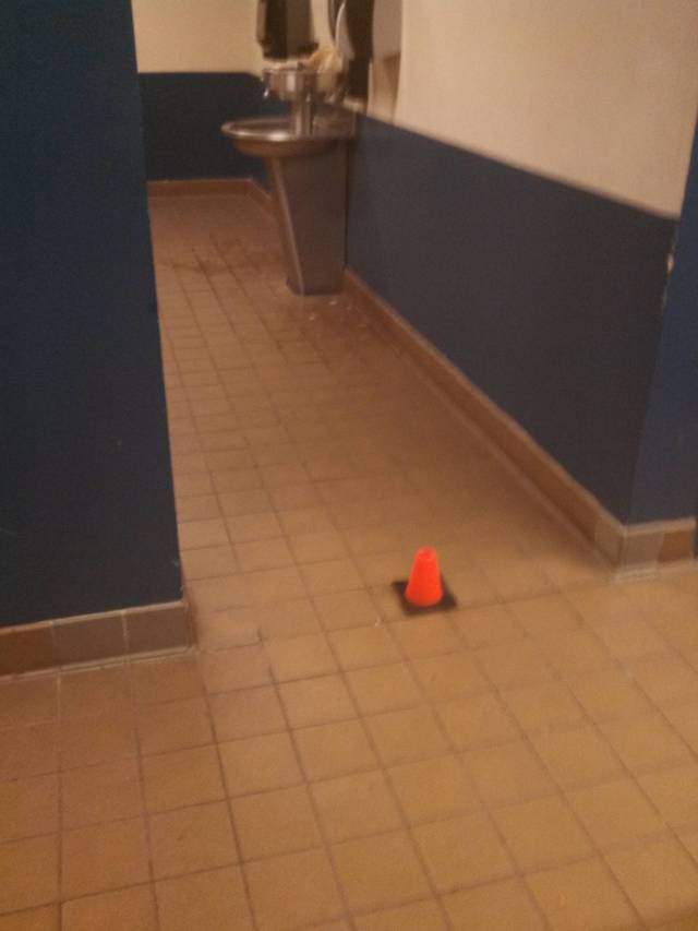 I put this little traffic cone in the entrance to the gym bathroom at our school and everybody who went to use the bathroom saw the cone, looked confused, and walked away. Nobody f*cks with traffic cones.