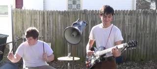 I have to admit I did not expect this kind of sound from a guy playing in his backyard and using a megaphone.