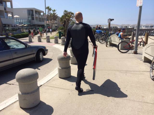 Obviously he has never worn a wetsuit before.