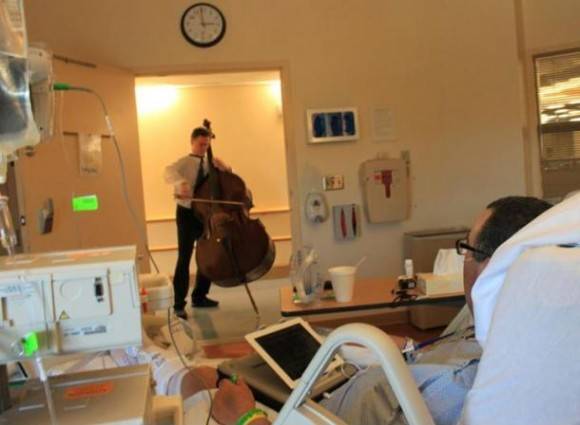 This guy went door-to-door at a local cancer treatment center, playing for those working towards recovery