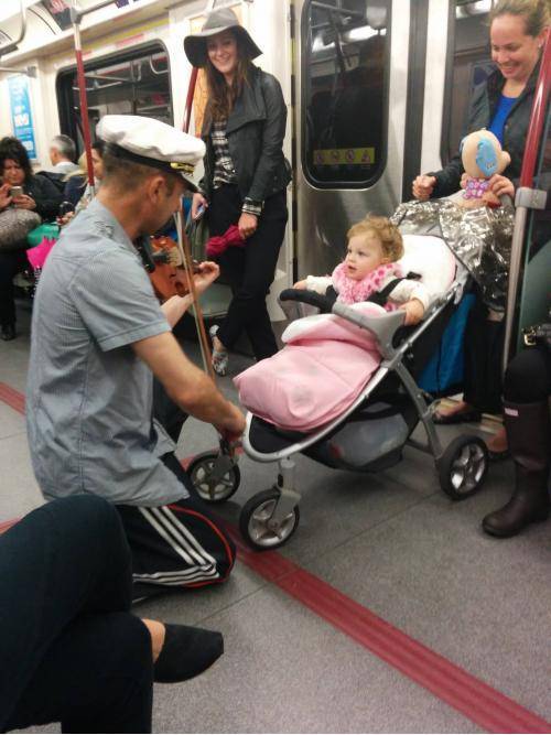 Man spent his subway ride playing his violin for a baby because it was crying