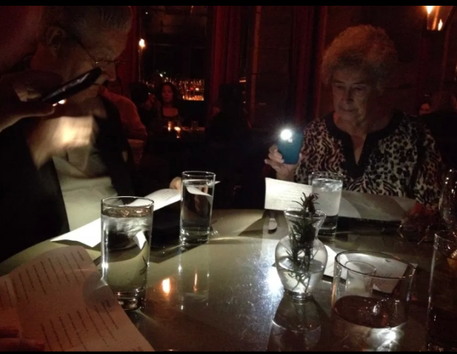 Took the parents to a fancy restaurant with mood lighting for my graduation.