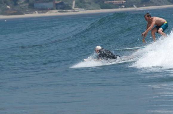 My grandfather and I riding what will most likely be his last wave. He turned 90 today.