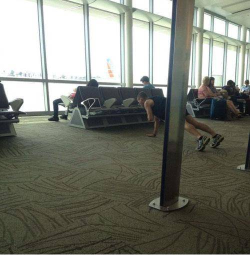 oh no, nobody has paid attention to me for 5 minutes at the airport; better break out the one handed push-ups